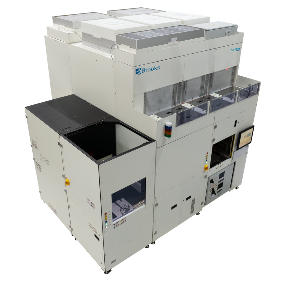 Large industrial semiconductor processing machine with control panel, multiple compartments, vents on top, and the Brooks logo visible on the upper section.